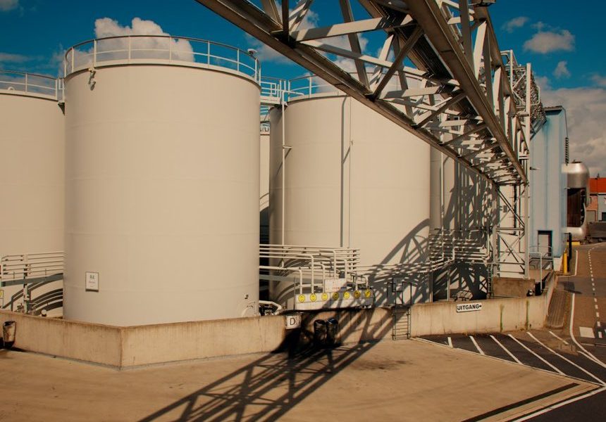 Rows of white bulk liquid storage tanks